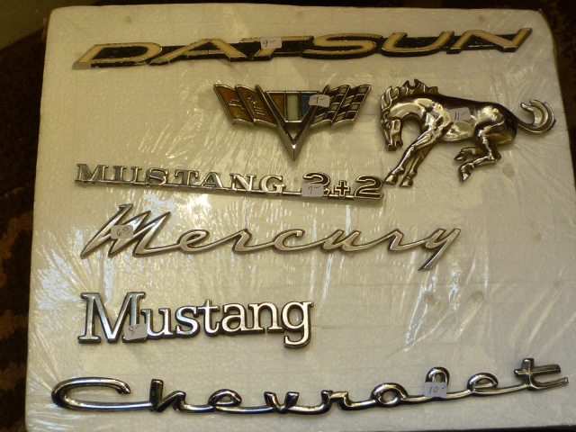 We've got some cool old car emblems in stock that might be the piece you